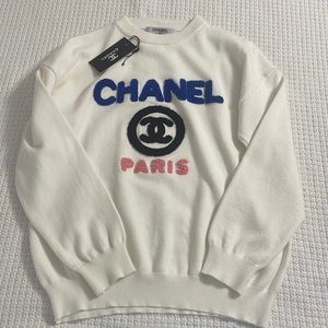 Chanel sweater.